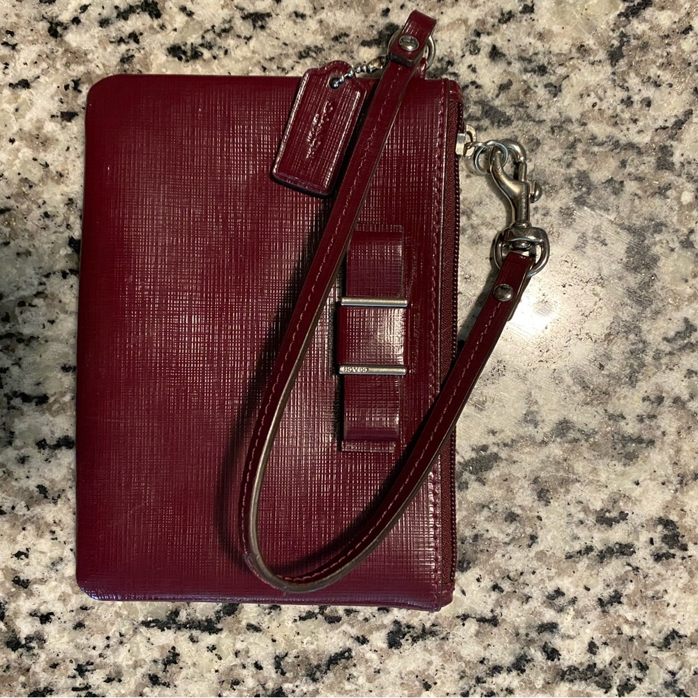 Maroon coach wristlet